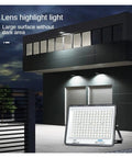 JUDYSSY High Brightness Led Flood Light 200W illuminating a dark outdoor area, showcasing its large surface design and brightness.