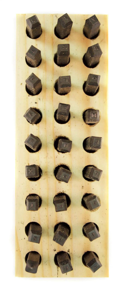 Rock Solid Wire Rope Sling Identification Tags Built Tough As Nails For Daily Rigging Grind Osha Compliant aluminum markers on wooden board.