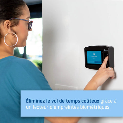 Woman using Biometric Fingerprint Time Clock With RFID And PIN Cloud Based Attendance System For Small Businesses One Stop Payroll Ready Time Tracking Solution Today mounted on wall