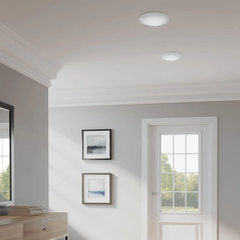 Bright White Led Flush Mount Ceiling Light With Sleek Round Design No Fuss Install Energy Efficient 3000K Warm in modern room