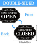 Waterproof Double Sided Open Or Closed Sign For Business with rope hanging 11.8 by 7.9 inches, front and back view.