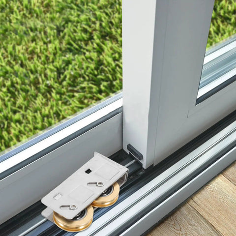 Get Your Track Setup Running Like Butter With These Heavy Duty Sliding Door And Window Pulleys Crafted From Premium Stainless Steel And Fitted With Dual Copper Wheels For Effortless Everyday Glide, showing silver pulleys on a sliding door track.