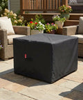 Square Fire Pit Cover Heavy Duty Tough As Nails 600D Fabric With PVC Coating All Weather Waterproof And Anti Crack installed on patio.
