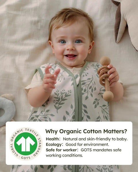 Baby wearing a Baby Sleep Sack 0-6 Months Wearable Blanket Pack of 3 100% Organic Cotton GOTS Certified With Smooth Two Way Zipper TOG 0.5