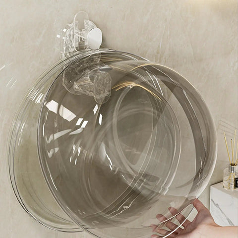 Grippy Wall Mount Hook With Heavy Duty Adhesive Strip No Stress Drilling Required holding a clear bowl on tile wall.