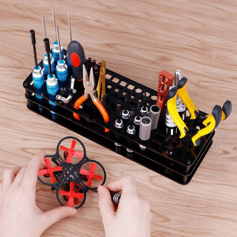63 Hole Screwdriver Storage Rack for Hex and Cross Bits - RC Tools Organizer Stand with tools, black plastic, on workbench