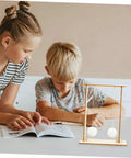 Children using Hands On Physics Experiment Tools Kit With Floating Ball For Students Fun Science Gear to learn STEM at home.