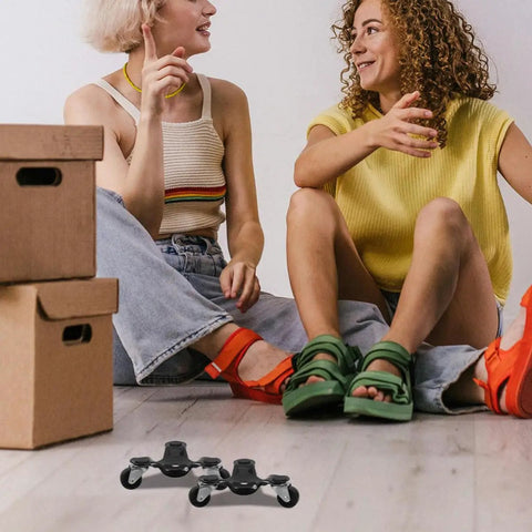4 Piece Heavy Duty Furniture Moving Dolly Set With Steel Triple Roller Wheels For Wood Floors, Built Like A Workhorse Ergonomic Furniture Mover Tool For Cabinets, Appliances And Heavy Items At Home Or In The Office, black dolly set on wood floor beside stacked boxes