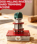 Heavy Duty Aluminum Router Table Insert Plate With Rock Solid Miter Guide Dual Metric Imperial Angle Scales And Rotating Sliding Ruler For Hassle Free Woodworking Setup Red on a wooden workbench.