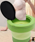 Portable Mini Washing Machine 6 Liter Foldable Compact Cleaner with lid, washing a pink bra for travel-friendly use.