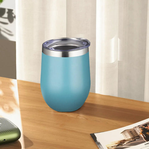 12oz Double Wall Vacuum Insulated Stemless Wine Tumbler With Straw And Lid Stainless Steel Cup on a wooden table with a light blue finish.