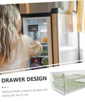 Multi Layer Plastic Egg Cartons That Serve As A Brilliant Fridge Staple keeping eggs organized in a fridge with a sleek drawer design.