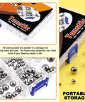 Front view of Tanstic 330-piece steel bearing ball assortment in a clear storage box with blue latch, 16 sizes 1–12 mm.