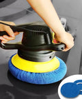 Close-up of Six Piece Blue Microfiber Buffing Pads fits Nine To Ten Inch Orbital Buffer and Polisher in use for car detailing.