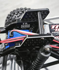 Close-up of Beefy Shock Mount With Multiple Mounting Positions For TRX4M Defender 1/18 RC Crawler Upgrades, showing CNC Aluminum Damper Holder.
