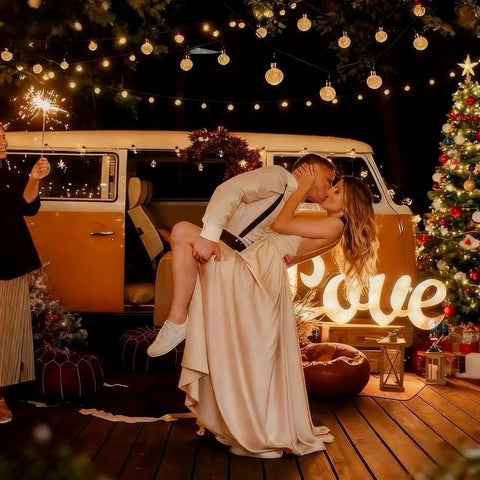 Solar String Lights Outdoor IP65 Waterproof 9.3 Feet With 20 Crystal Globe Bulbs Warm White illuminating a cozy romantic scene.