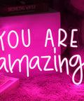 Pink You Are Amazing LED Neon Light Sign for wall decor, bedrooms, living rooms, bars, 16.9 by 10.6 inches USB powered, table display