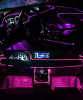 Car interior with purple glow from RGB Car Interior Lighting Kit With Fiber Optic 6 In 1 Ambient Light 315 Inches Integrated Fiber Optic 16 Million Colors Wireless App And Remote Control Sync To Music For A Customizable Immersive Driving Experience.