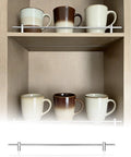 Anti Fall Metal Shelf Guard Rail Set For 16 Inch Protection, silver guard on wooden shelf with mugs, fits 10 to 38 inch shelves