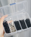 Clear See Through Plastic Storage Box For Cosmetics And Tiny Tools Handy Portable Organizer For Makeup Jewelry Screws Hardware Fishing Tackle And Craft Accessories Compact 5.5 By 3.5 By 1.3 Inch held open with compartments visible