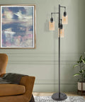 Dimmable 3-Light Oil Rubbed Bronze Farmhouse Floor Lamp With Amber Glass Shades in living room setting