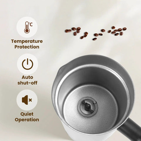 Inside view of 4 In 1 Milk Frother And Steamer With 10 6 Oz Capacity Electric Foam Maker showing ceramic lining and frothing whisk.