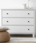 Premium 4 Pack 1.37 Inch Round Marble Cabinet Knobs With A Fresh Black And White Liquid ABS Cabochon Glass Finish on modern dresser.