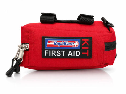 Front view of 164 Piece Outdoor Adventure First Aid Kit With Color Coded Supplies For Camping Hiking Road Trips And Car Survival Gear ANSI OSHA Compliant Emergency Medical Kit For Quick Access, red fabric bag with logo.