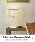 Boho Table Lamp With USB Charging Port and Birch Wood Bead Details on a Wooden Table in a Living Room