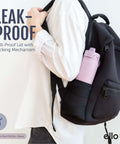 Person carrying backpack with Pop And Fill 22oz Stainless Steel Water Bottle With Quick Fill Lid Dual Sip Or Chug in side pocket.
