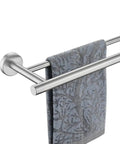 Double Bath Towel Bar 39 Inch Overall Usable 36 Inch, Premium 304 Stainless Steel 1mm Thick Tube With 2mm Posts, Brushed Wall Mount Towel Rack for Bathroom, No Fuss Rust Resistant and Durable holding a towel