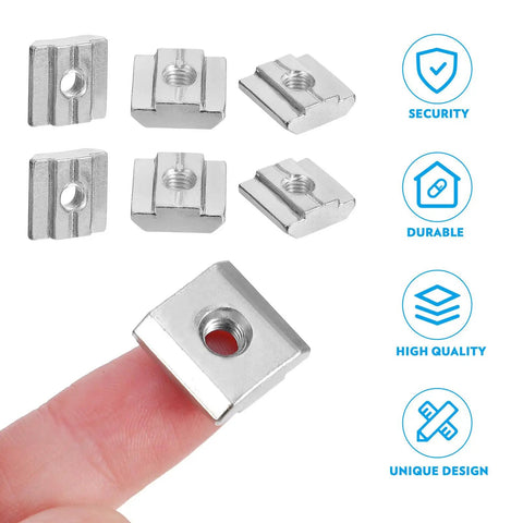 50 Pack T Slot Nuts Carbon Steel Sliding Fasteners For Aluminum Tracks CNC Routers DIY Shop Builds Heavy Duty Drop In Hardware That Stays True No Fuss Workshop Gear, close-up of nut on finger, showing detailed threaded design.