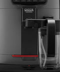 Automatic Espresso And Over Ice Coffee Maker With Professional Auto Milk Frother For Bold Iced Refreshers And Daily Grind Dominance In Sleek Moonlight Grey front view with clear plastic milk jug.