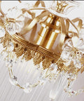 Close-up of Modern Brass Wall Sconces With Glittering Acrylic Jewel Drops for Bedroom Living Room Hallway Lighting, showcasing brass and crystal details.