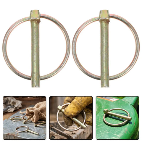 Get Your Yard Gear Fixin' With These 12 Heavy Duty Carbon Steel Retaining Pins Featuring Ring Locks For Tractors Mowers And Trailers To Keep Everything Secure And Rust-Free In The Dirt, showcasing two golden wire lock pins.