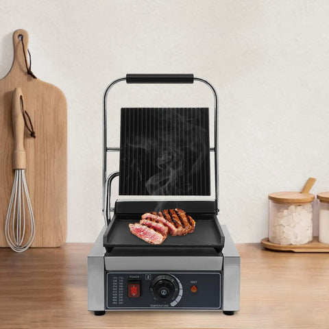Heavy Duty Electric Panini Press Grill With 1800W Dual Heating Plates For Perfectly Grilled Steaks Hamburgers And Crispy Toasted Sandwiches featuring a grilled steak on the cooking surface.