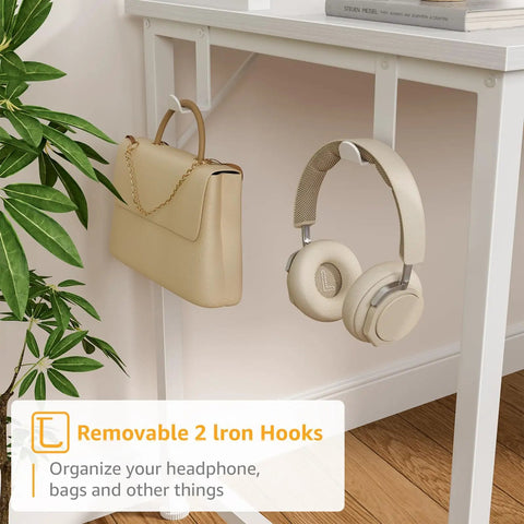 Close-up of white computer desk with hutch and drawers, showing removable iron hooks holding headphones and a bag