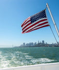 American Flag 12 By 18 Inches Embroidered 50 Stars Nylon Outdoor Banner For Marine Boat Yacht And UTV With Two Brass Grommets Built Tough Heavy Duty US Flag Designed For Outdoor Use flying on a boat.