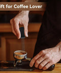 Person using Espresso Distribution Tool With 0.4mm 10 Needle Stirrer Break Up Grounds Reduce Channeling Achieve Even Extraction For Home And Commercial Espresso Machines Black on portafilter.