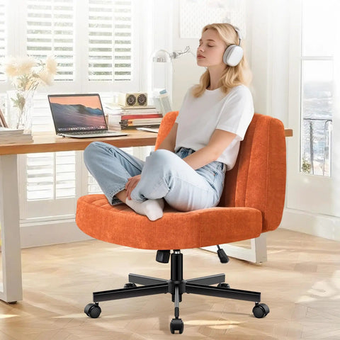 Woman sitting on Criss Cross Office Chair with Pocket Springs, Extra Wide 25In Seat, Orange, in home office setting