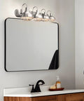 36-Inch 4-Light Modern Industrial Vanity Light With Metal Cage Shades in brushed nickel above bathroom mirror