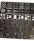 Hella Durable 36 Piece Stainless Steel Hobby Detailing Set With Slick Carving Rulers Scribe Markers And Top Shelf Drill Hole Stencils For Scale Gundam And Military Model Kits Crafting template sheet featuring various stencil designs.