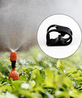 Adjustable Water Flow Control Tube Clips for 1/4-1/2 inch tubes, shown in use with garden irrigation system.
