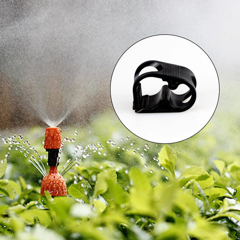 Adjustable Water Flow Control Tube Clips for 1/4-1/2 inch tubes, shown in use with garden irrigation system.