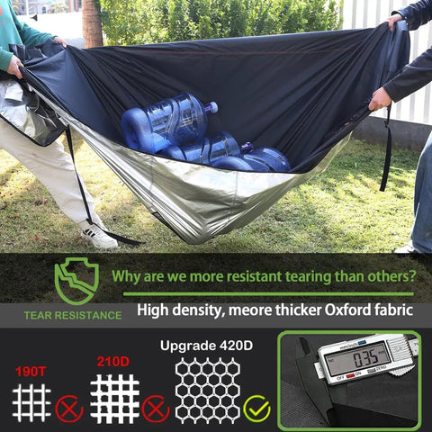 Two people demonstrating tear resistance of heavy duty waterproof outdoor sofa cover by holding water bottles inside.