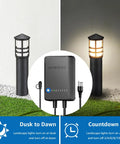 All In One LED Landscape Lighting Kit With Eight Low Voltage Path Lights, 60W Transformer, dusk to dawn feature shown
