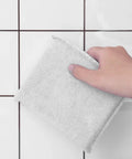 Boss Grade Microfiber Sealer Applicator Pad Set Real Workhorse Tool For Spreading Sealant On Marble Granite Concrete Ceramic And Slate Surfaces Washable Floor Prep Sponge White 12 Pack in use on tile.