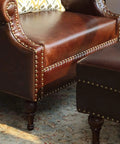 100 Pcs Antique Brass Upholstery Tacks 3/4 Inch Furniture Nails used on leather armchair with decorative nailhead trim.