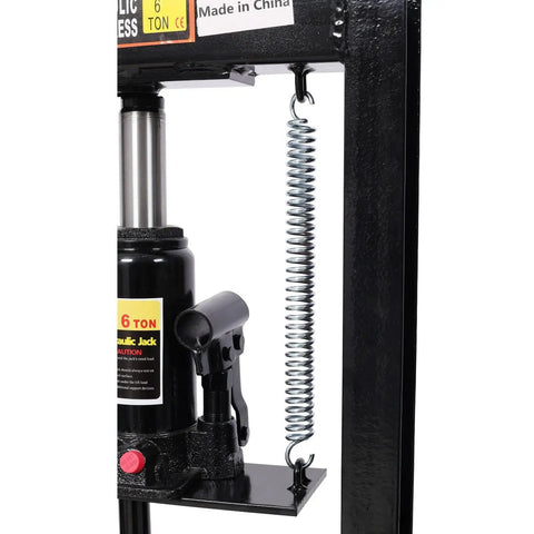 Close-up of Six Ton Hydraulic Shop Press With Precision Pressure Gauge for Bearing Install Auto Maintenance and Metal Fabrication 13000 Lb Load Rating.