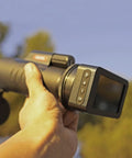Person holding Pro Grade Spotting Scope Camera for Hunting and Camping with Adjustable Wireless Live HD Video and Dual Light.